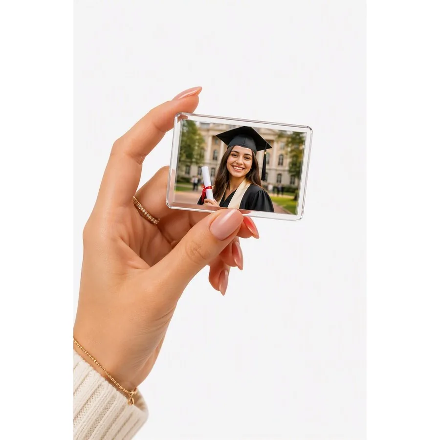 Graduation photo magnet, held in hand